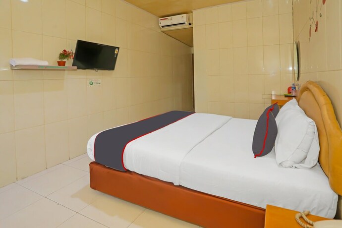 Imagen general del Hotel SUPER OYO Capital O 92676 Sion Holiday. Foto 13