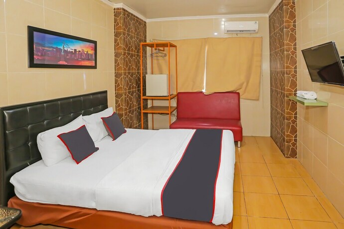 Imagen de la habitación del Hotel SUPER OYO Capital O 92676 Sion Holiday. Foto 20