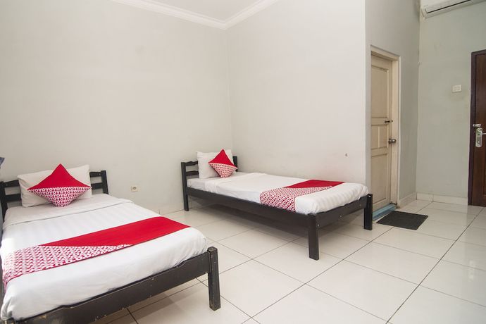 Imagen de la habitación del Hotel SUPER OYO Collection O 1401 Maya. Foto 7