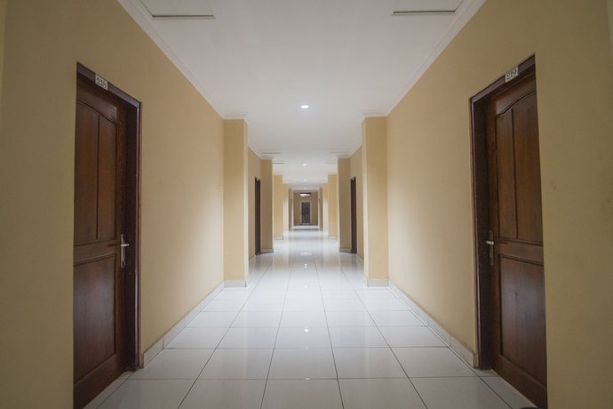 Imagen de los interiores del Hotel SUPER OYO Collection O 1401 Maya. Foto 19