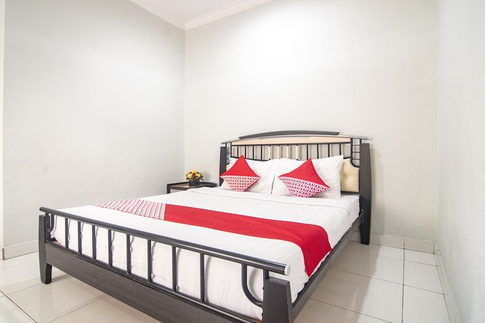 Imagen de la habitación del Hotel SUPER OYO Collection O 1401 Maya. Foto 10