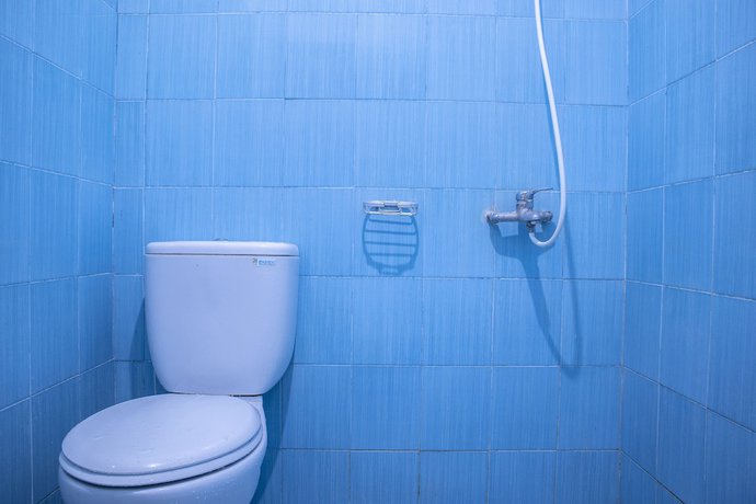 Imagen de la habitación del Hotel SUPER OYO Collection O 1401 Maya. Foto 11