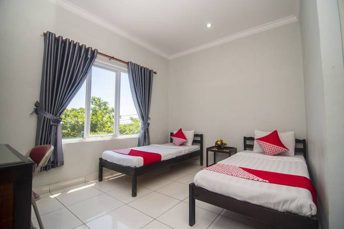 Imagen de la habitación del Hotel SUPER OYO Collection O 1401 Maya. Foto 14