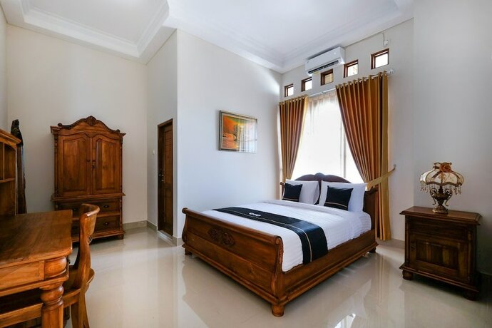 Imagen de la habitación del Hotel SUPER OYO Collection O 3468 Ndalem Gusti Ayu, Depok. Foto 17