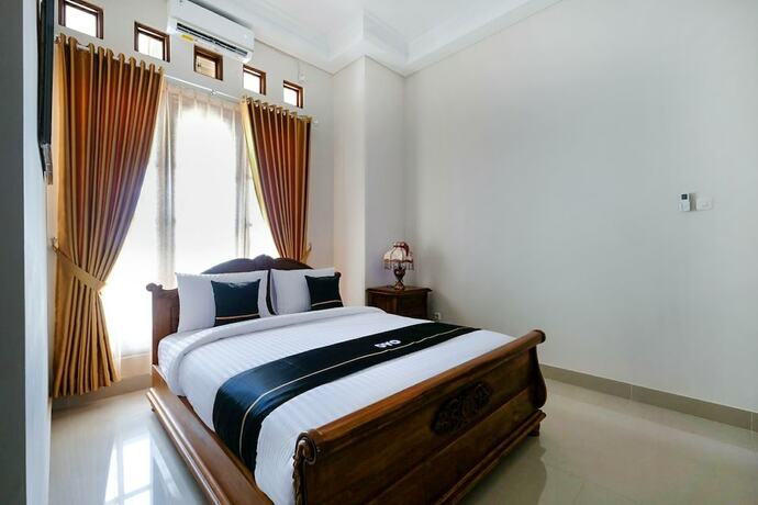 Imagen de la habitación del Hotel SUPER OYO Collection O 3468 Ndalem Gusti Ayu, Depok. Foto 18