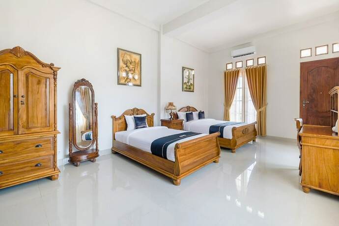 Imagen de la habitación del Hotel SUPER OYO Collection O 3468 Ndalem Gusti Ayu, Depok. Foto 20