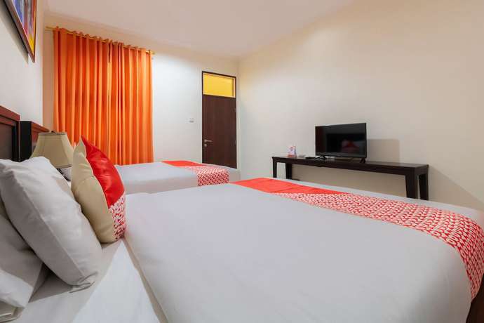 Imagen de la habitación del Hotel SUPER OYO Flagship 2688 Guntur. Foto 6