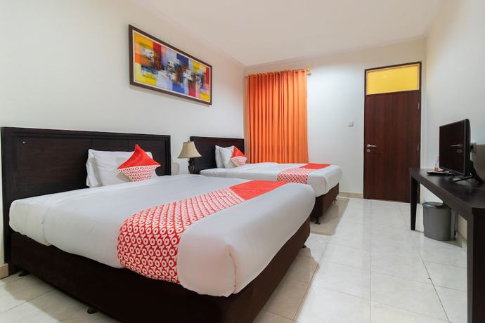 Imagen de la habitación del Hotel SUPER OYO Flagship 2688 Guntur. Foto 9