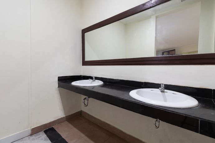Imagen de la habitación del Hotel SUPER OYO Flagship 2688 Guntur. Foto 10