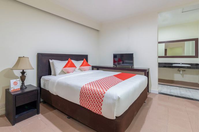 Imagen de la habitación del Hotel SUPER OYO Flagship 2688 Guntur. Foto 16