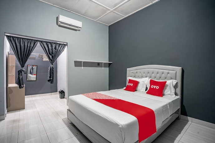 Imagen de la habitación del Hotel SUPER OYO Gandaria Guest House Near Masjid Raya Sumatera Barat. Foto 2