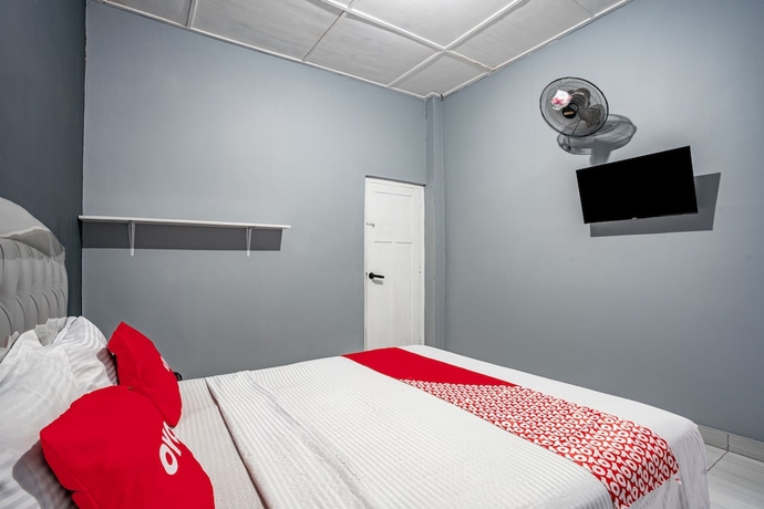 Imagen de la habitación del Hotel SUPER OYO Gandaria Guest House Near Masjid Raya Sumatera Barat. Foto 3
