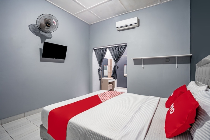 Imagen de la habitación del Hotel SUPER OYO Gandaria Guest House Near Masjid Raya Sumatera Barat. Foto 6