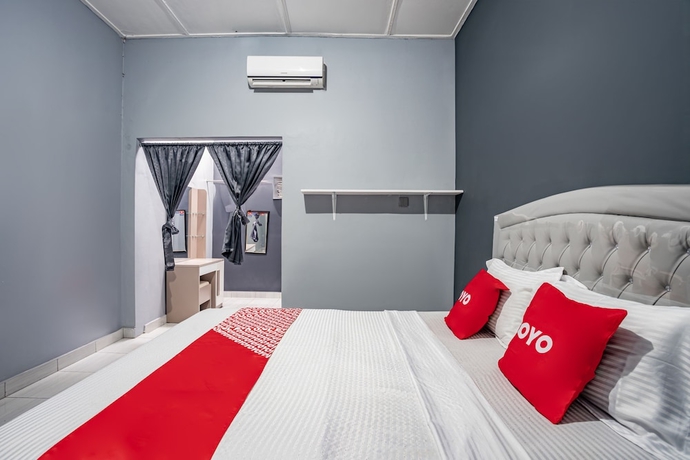 Imagen de la habitación del Hotel SUPER OYO Gandaria Guest House Near Masjid Raya Sumatera Barat. Foto 7