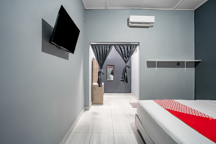 Imagen de la habitación del Hotel SUPER OYO Gandaria Guest House Near Masjid Raya Sumatera Barat. Foto 8