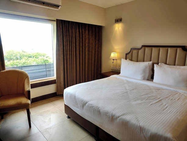 Imagen de la habitación del Hotel SURYANSH HIGH CITY. Foto 11