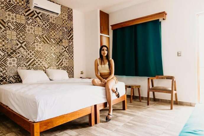 Imagen de la habitación del Hotel SUUCILHA. Foto 18