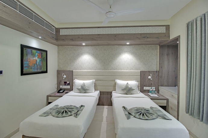 Imagen de la habitación del Hotel SVASTI Inn Jamnagar. Foto 4