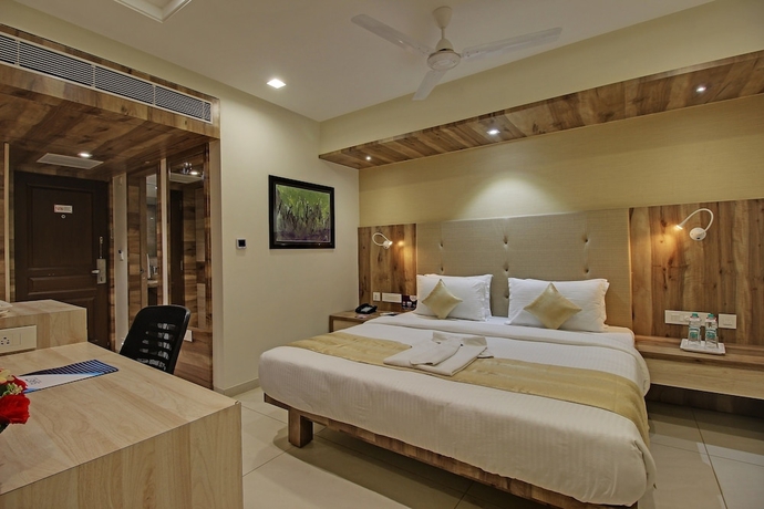 Imagen de la habitación del Hotel SVASTI Inn Jamnagar. Foto 5