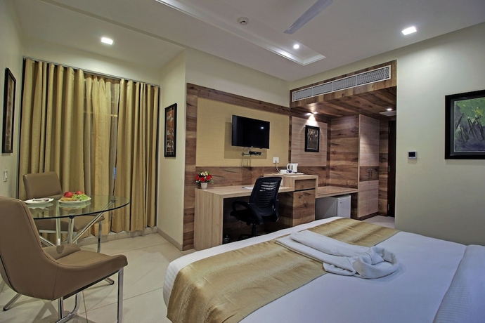 Imagen de la habitación del Hotel SVASTI Inn Jamnagar. Foto 6