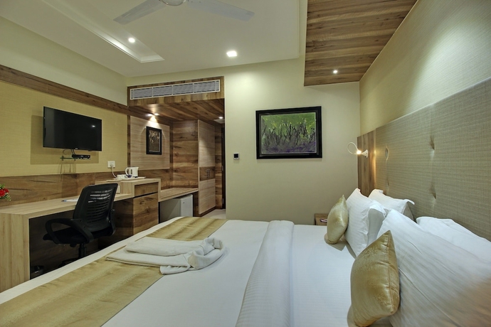 Imagen de la habitación del Hotel SVASTI Inn Jamnagar. Foto 9