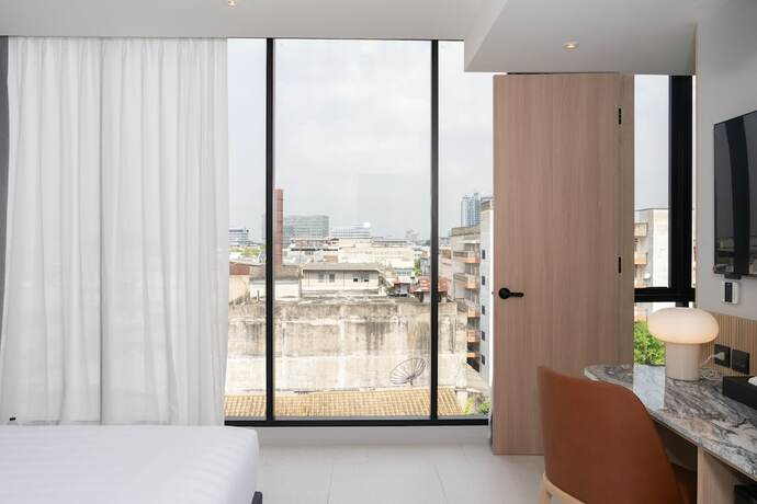 Imagen de la habitación del Hotel Saan Sathorn. Foto 21