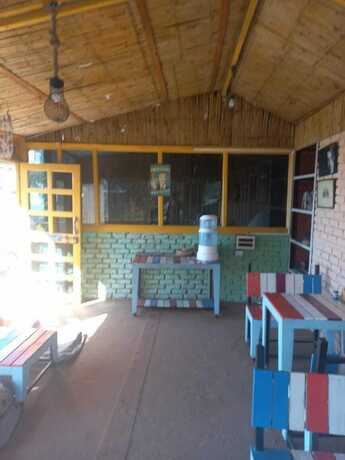 Imagen del bar/restaurante del Hotel Saanjh Resorts Pangot. Foto 16