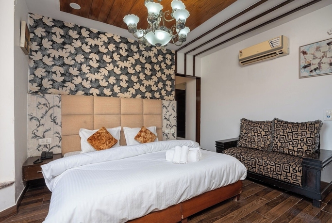 Imagen de la habitación del Hotel Saavi Huda City Centre. Foto 7