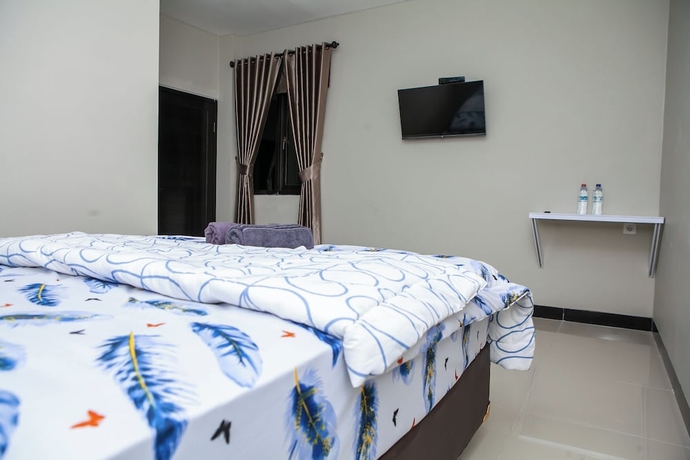 Imagen de la habitación del Hotel Saba Ayu Guest House. Foto 1