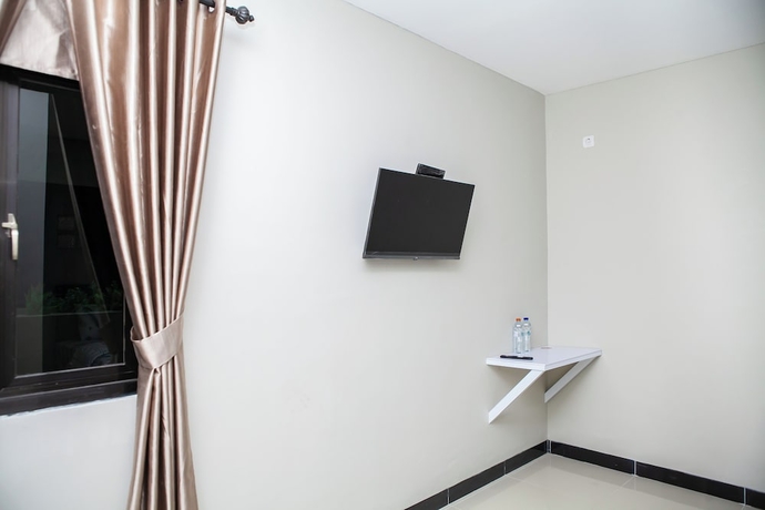 Imagen de la habitación del Hotel Saba Ayu Guest House. Foto 11