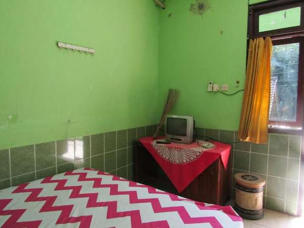 Imagen de la habitación del Hotel Sabar Menanti 2, Parangtritis. Foto 14