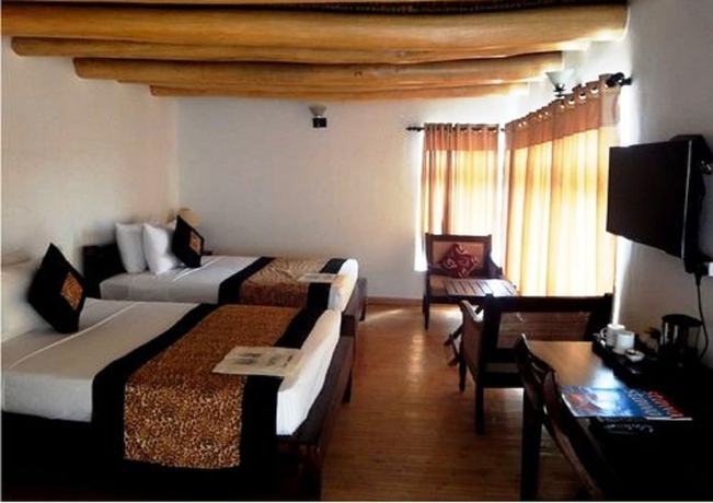 Imagen de la habitación del Hotel Saboo Resorts. Foto 7
