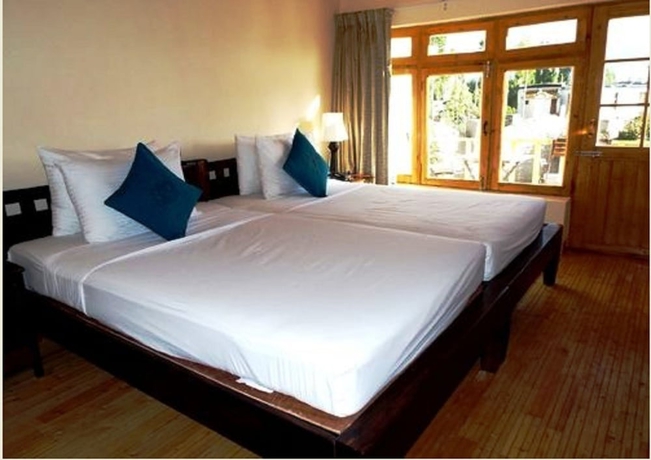 Imagen de la habitación del Hotel Saboo Resorts. Foto 10