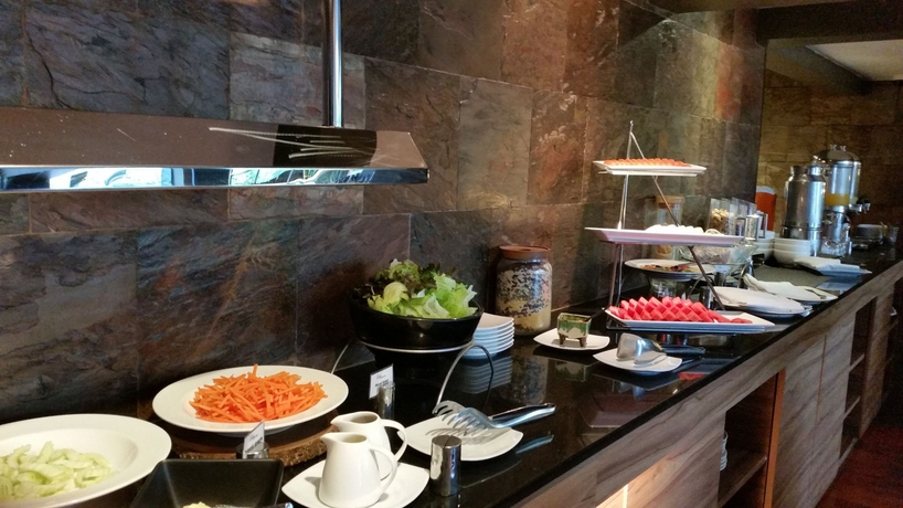 Imagen del bar/restaurante del Hotel Sacha's Uno. Foto 5