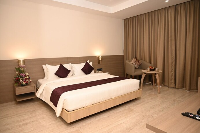 Imagen de la habitación del Hotel Sachikas, Guwahati. Foto 18