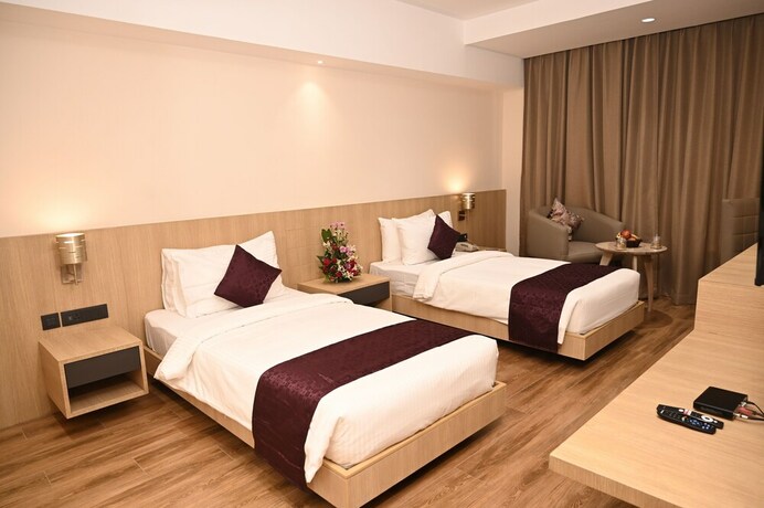 Imagen de la habitación del Hotel Sachikas, Guwahati. Foto 19