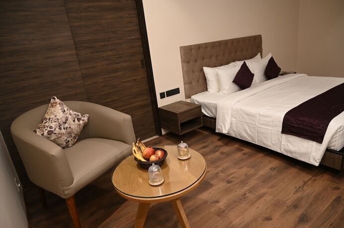 Imagen de la habitación del Hotel Sachikas, Guwahati. Foto 21