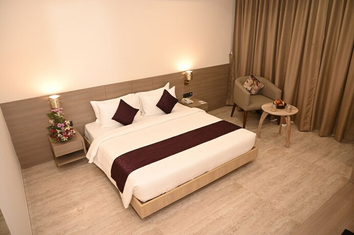 Imagen de la habitación del Hotel Sachikas, Guwahati. Foto 22
