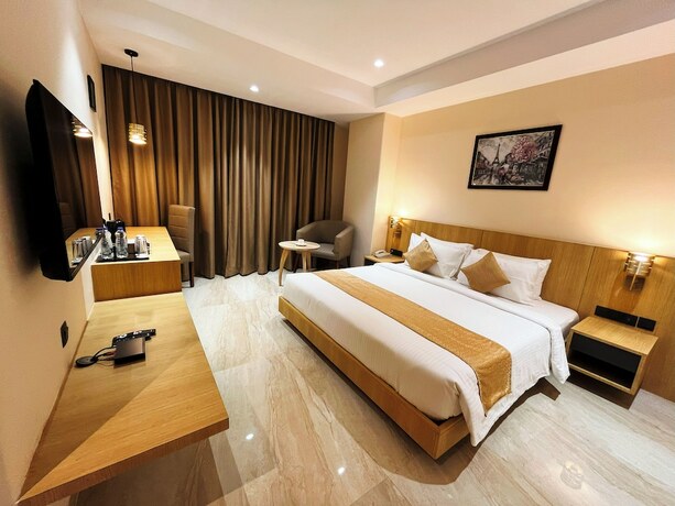 Imagen de la habitación del Hotel Sachikas, Guwahati. Foto 23