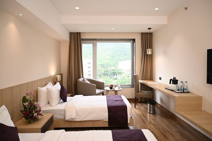 Imagen de la habitación del Hotel Sachikas, Guwahati. Foto 24