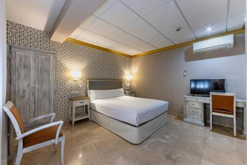 Imagen de la habitación del Hotel Sacromonte. Foto 3