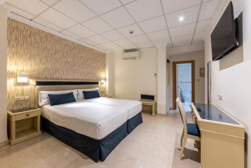 Imagen de la habitación del Hotel Sacromonte. Foto 7