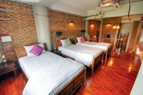 Imagen de la habitación del Hotel Saeng Panya Home. Foto 2