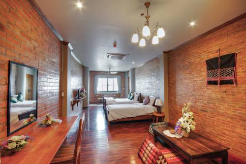 Imagen de la habitación del Hotel Saeng Panya Home. Foto 5