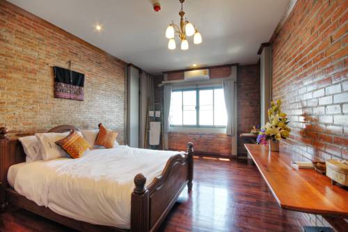 Imagen de la habitación del Hotel Saeng Panya Home. Foto 6