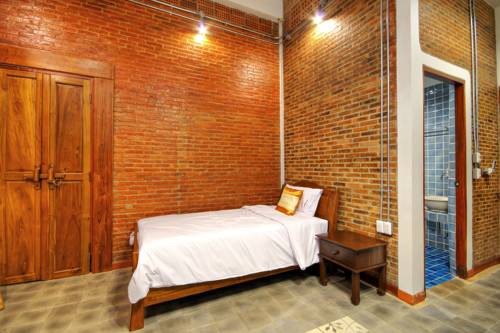 Imagen de la habitación del Hotel Saeng Panya Home. Foto 11