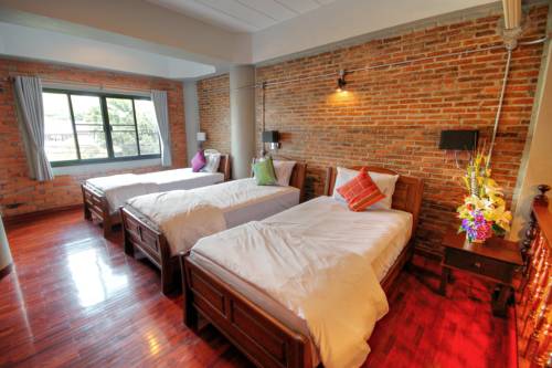 Imagen de la habitación del Hotel Saeng Panya Home. Foto 12