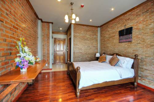 Imagen de la habitación del Hotel Saeng Panya Home. Foto 13