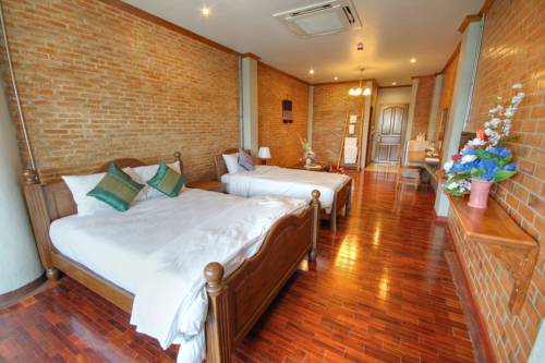 Imagen de la habitación del Hotel Saeng Panya Home. Foto 14