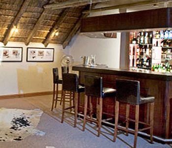 Imagen del bar/restaurante del Hotel Safari Club Sa. Foto 3